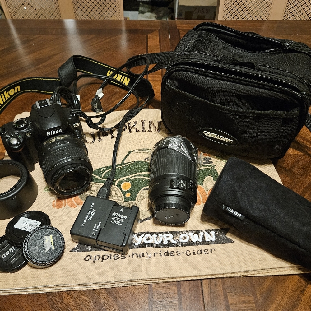 Excellent condition Nikon D60 with two lenses and one new!